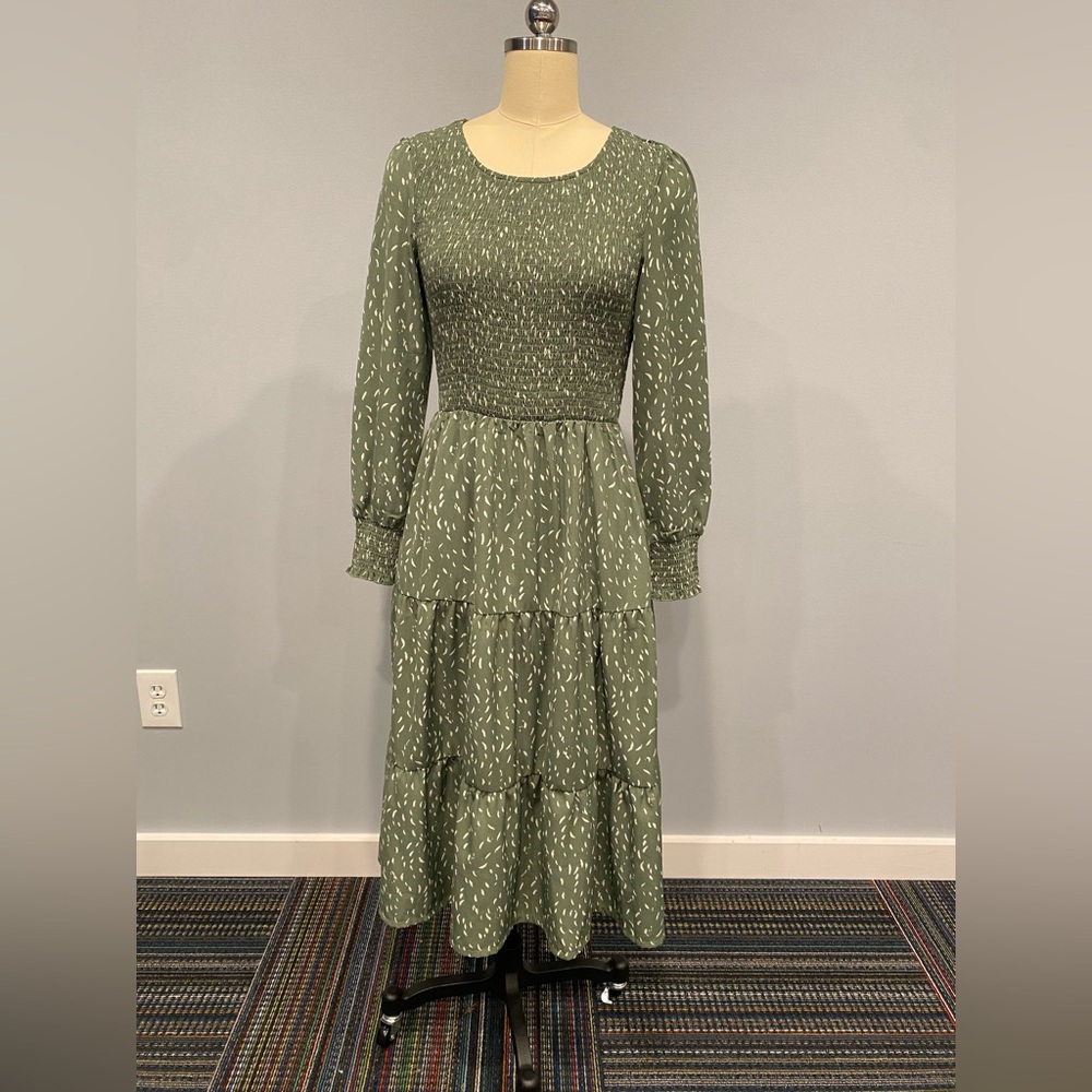 Green smocked dress with white leaves